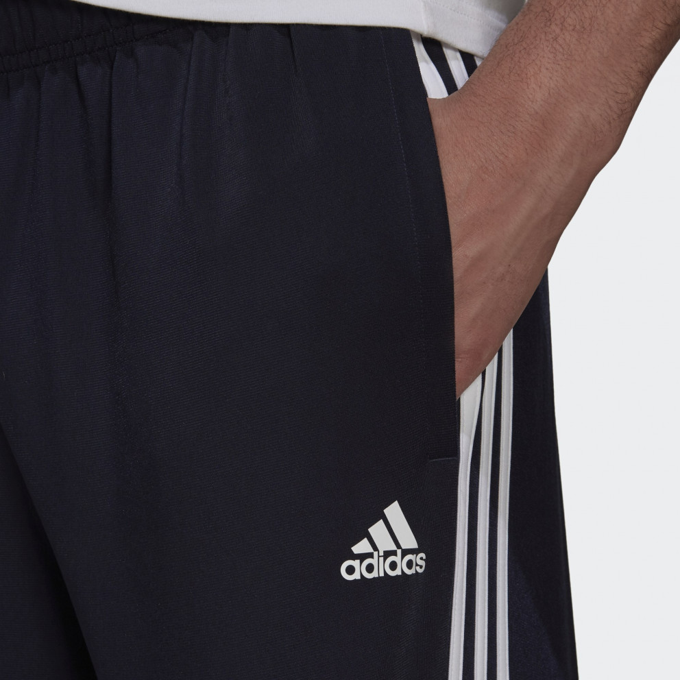 essentials warm up tapered 3 stripes track pants