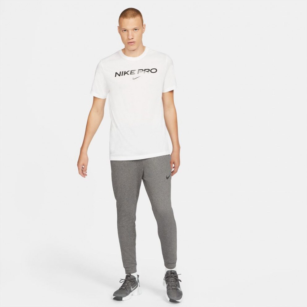 Nike Dri FIT Men s Tapered Training Trousers Grey CZ6379 071