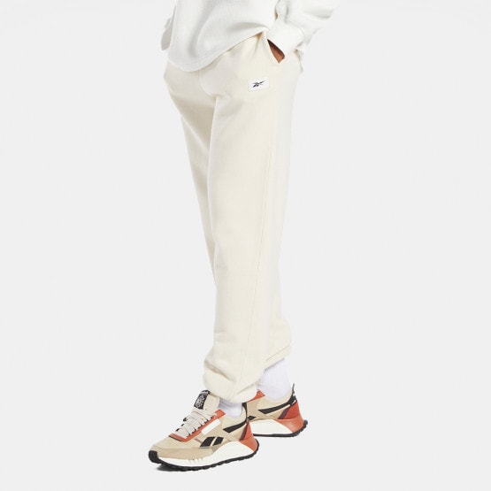 Nike Plus Mini Swoosh Oversized joggers in Natural