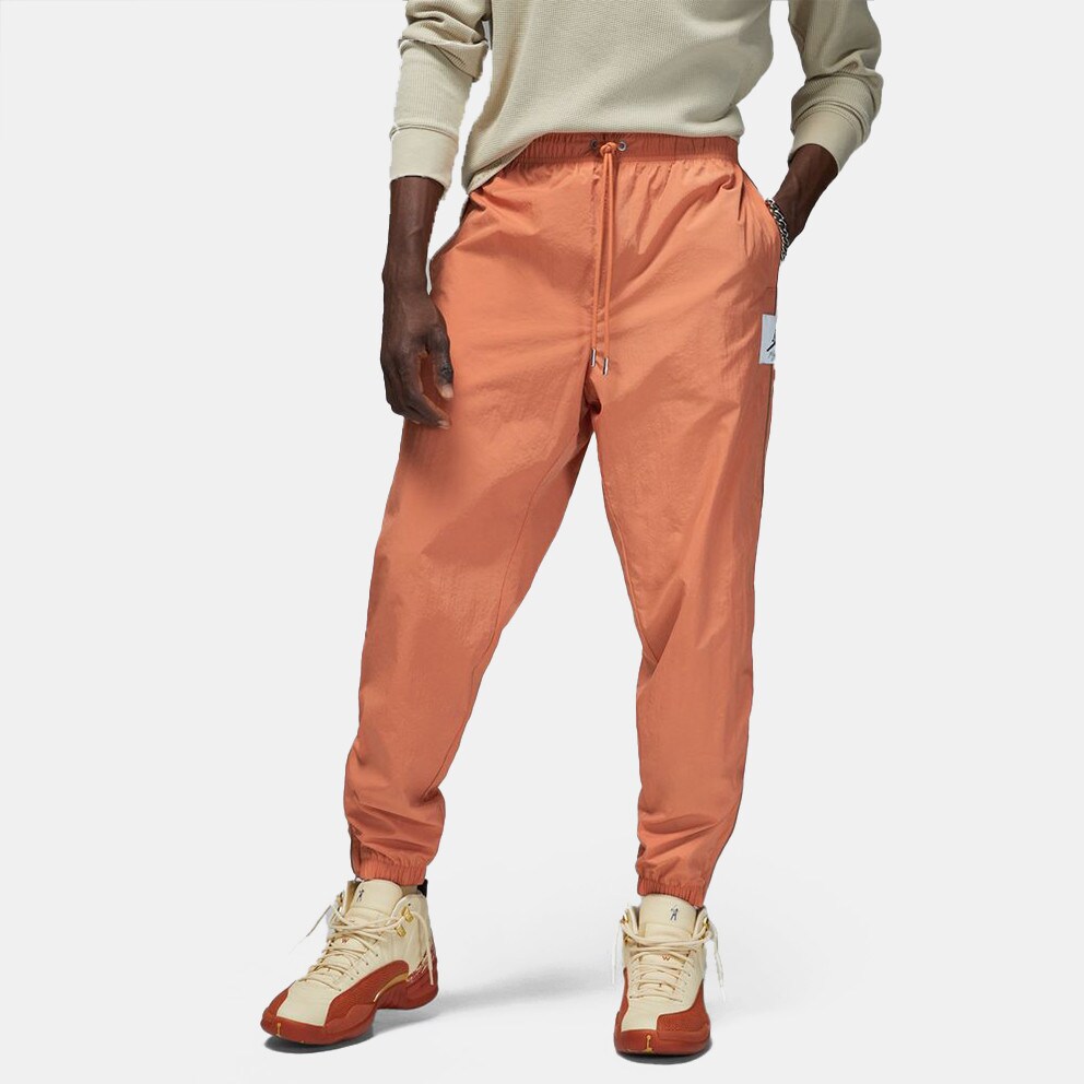 872 Jordan Essentials Men s Track Pants Orange DV7622 Air