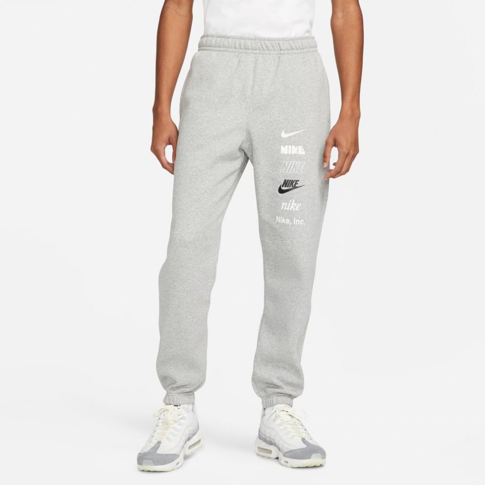 Nike M Nk Club+ Bb Cf Pant Mlogo DK GREY HEATHER DX0795-063