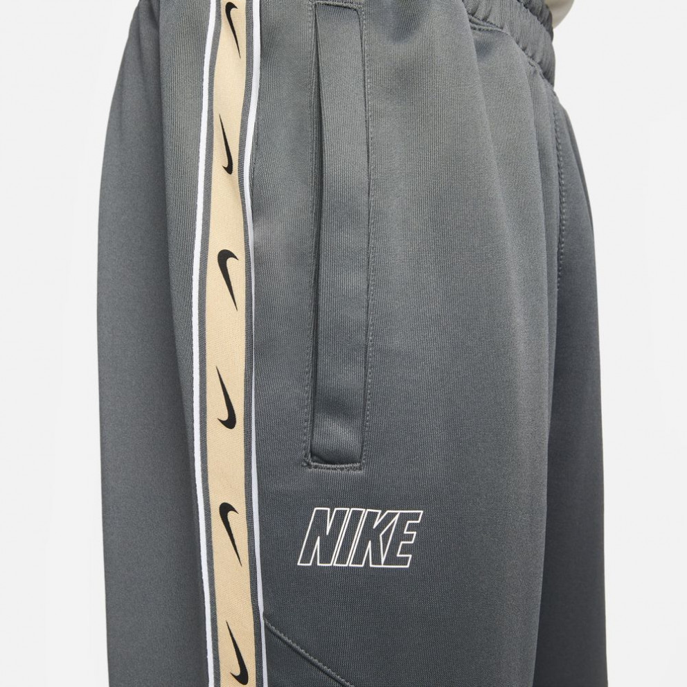 Nike repeat tape track pants new arrivals