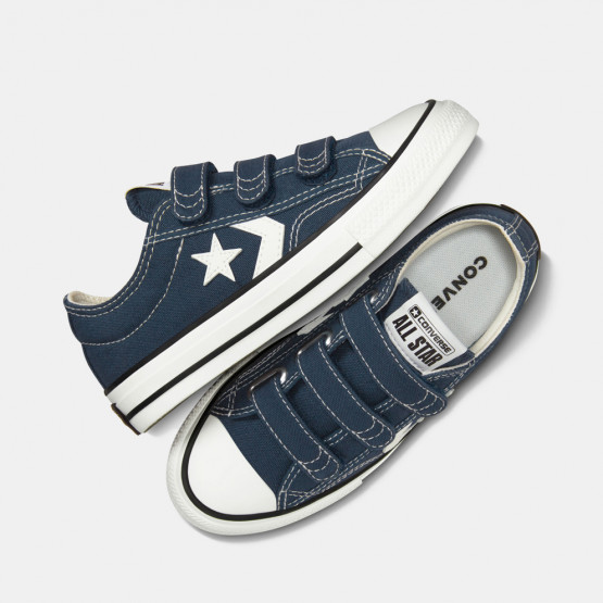 North West in white converse und All Star sneakers