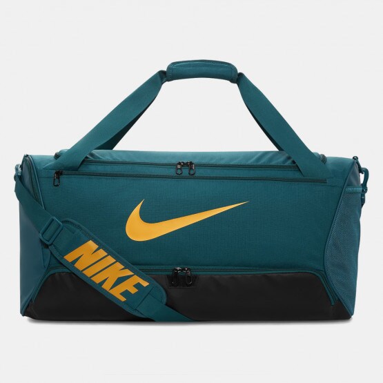 Buy the Nike Nike Heritage bum bag with iridescent logo in khaki on