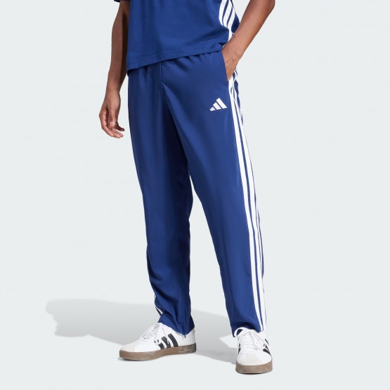 Adidas blue striped pants deals